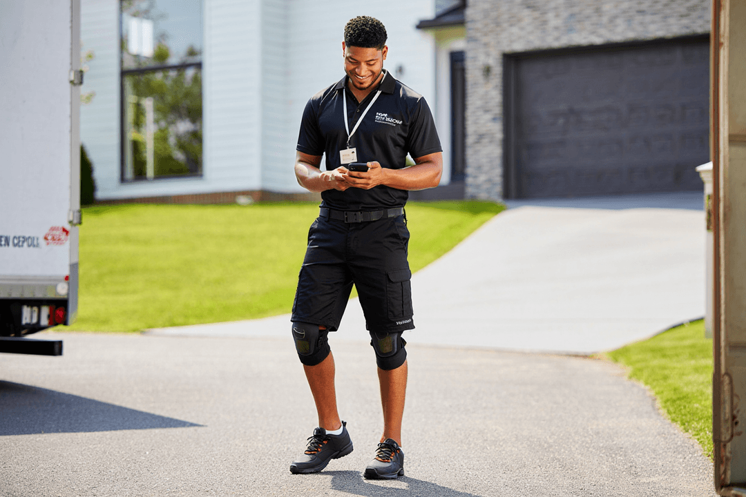Mover using mobile app on job site